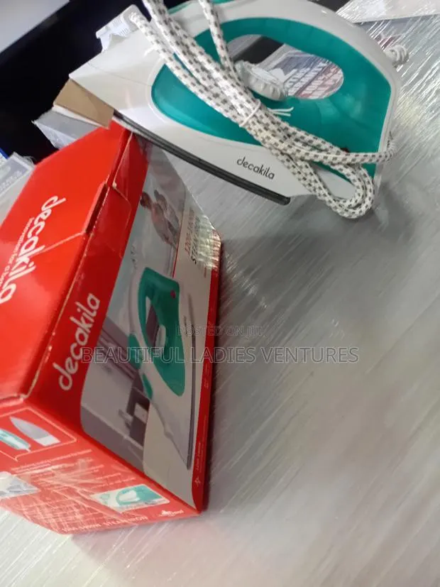 Easy Glide Steam Iron for Wrinkle-Free Clothes · Photo 1