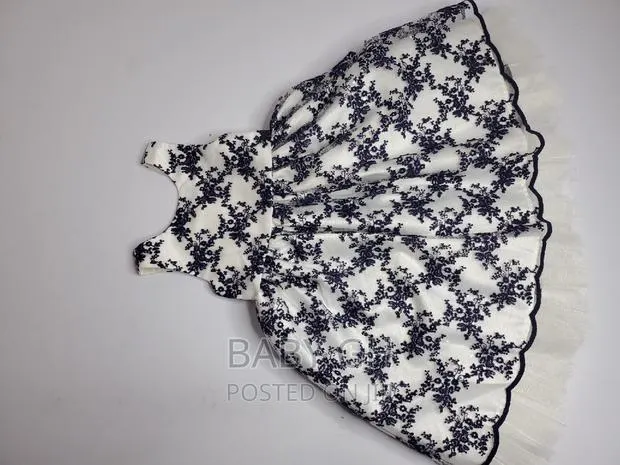 Blue and White Girls Occasion Dress With Floral Design · Photo 1