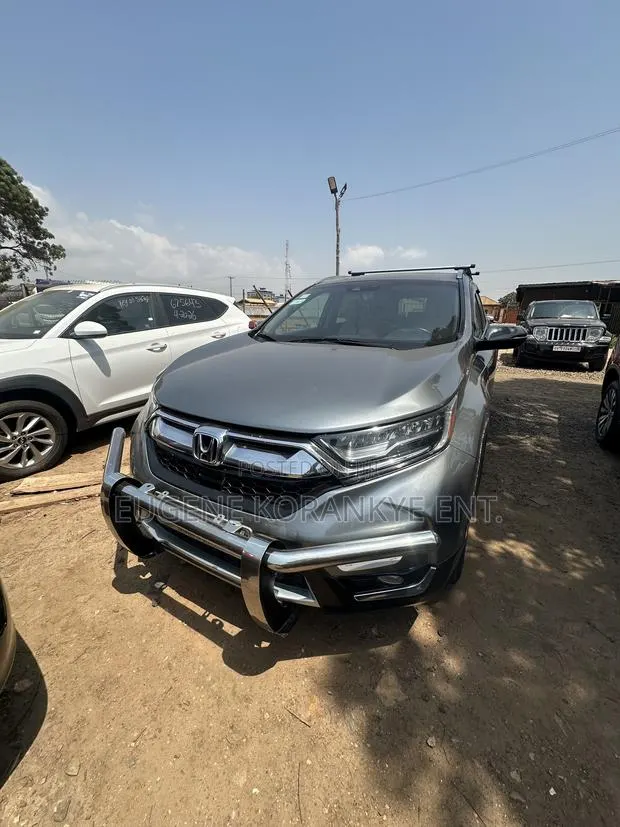 Honda CR-V Touring 4dr SUV AWD (1.5L 4cyl CVT) 2017 Silver · Photo 1