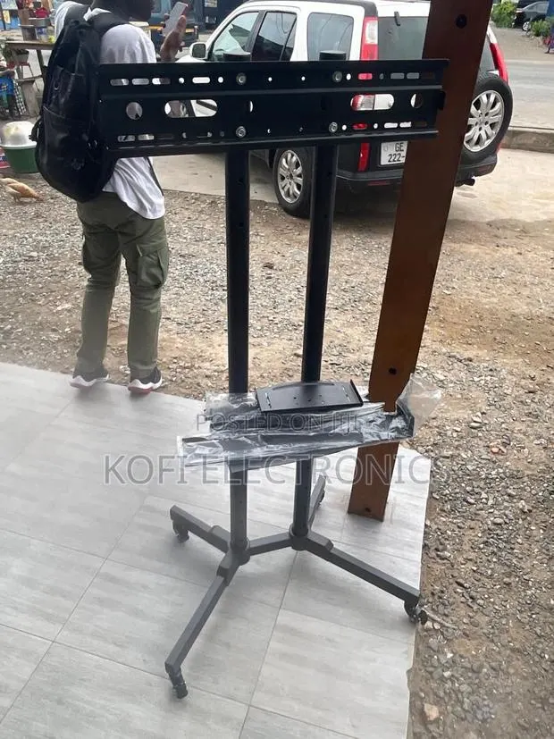 Height Adjustable Tv Trolley With Shelf 32- 70” · Photo 1