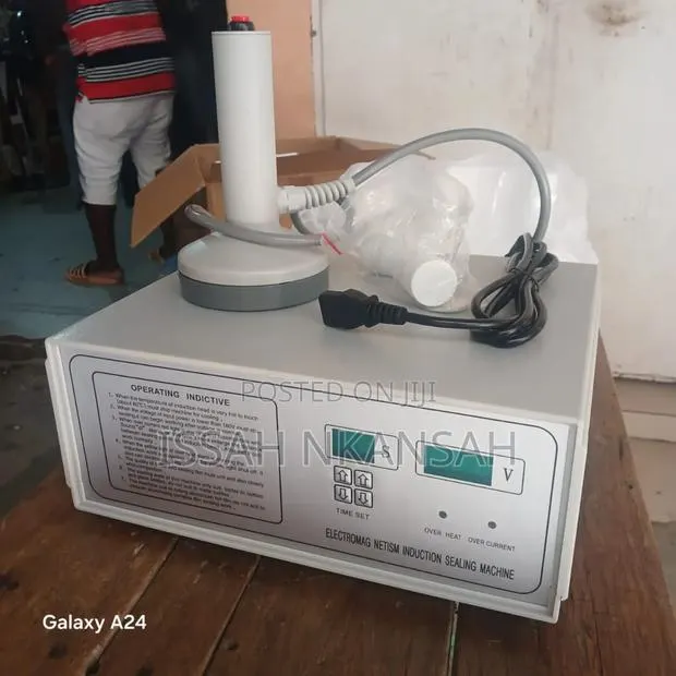 Electromagnetic Induction Sealing Machine · Photo 1