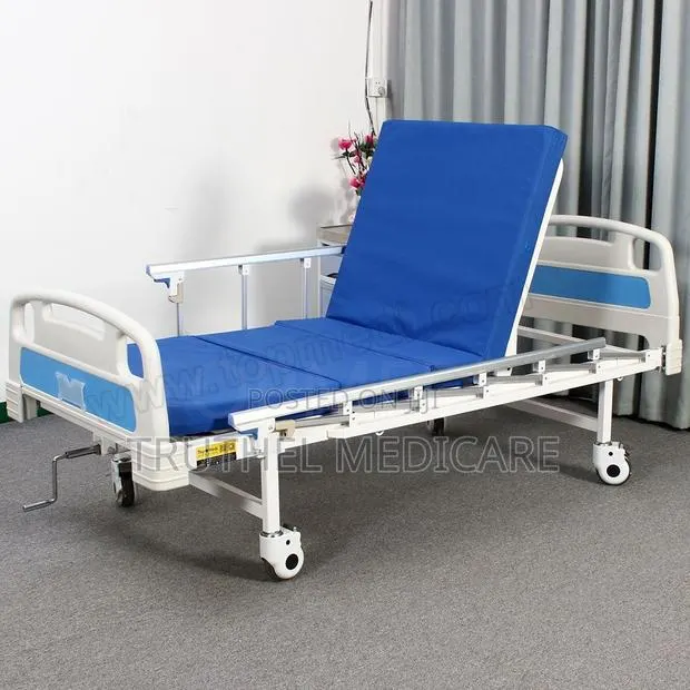Hospital Bed - 1crank(Free Mattress, Iv Pole, Table) · Photo 1