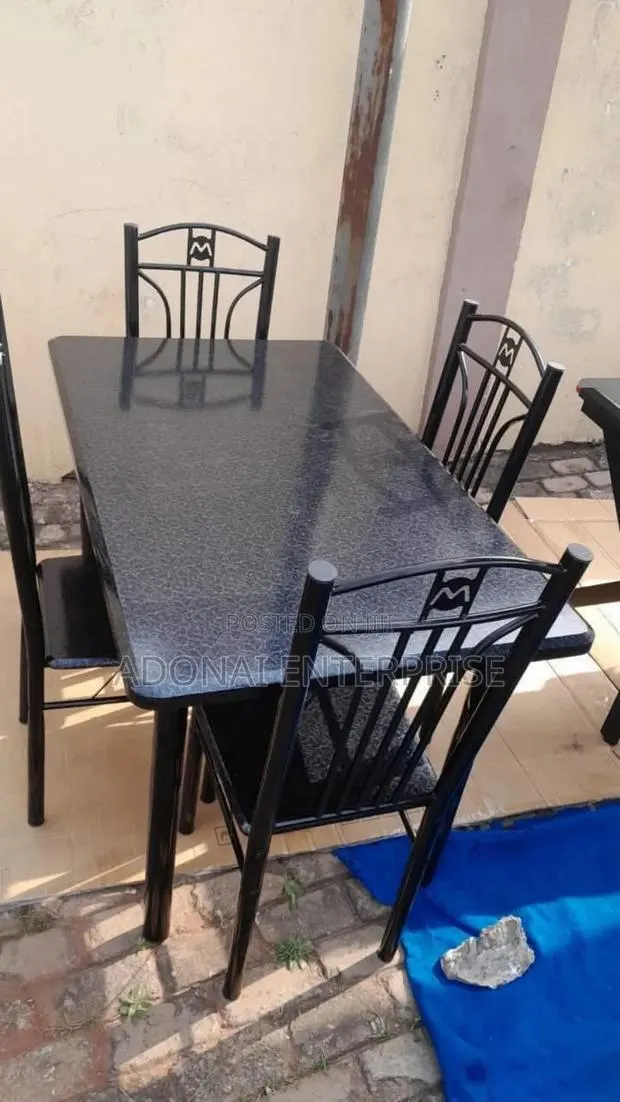 Beautiful Dining Table and Set of Chairs Avnkh4186r · Photo 1