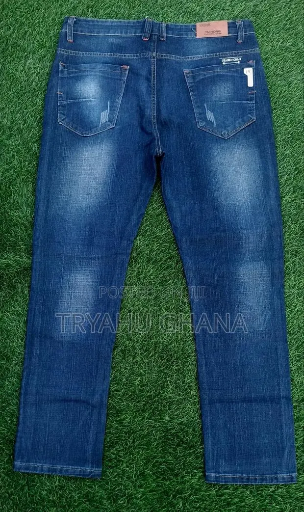 Yu Hong Faded Blue Jeans · Photo 1