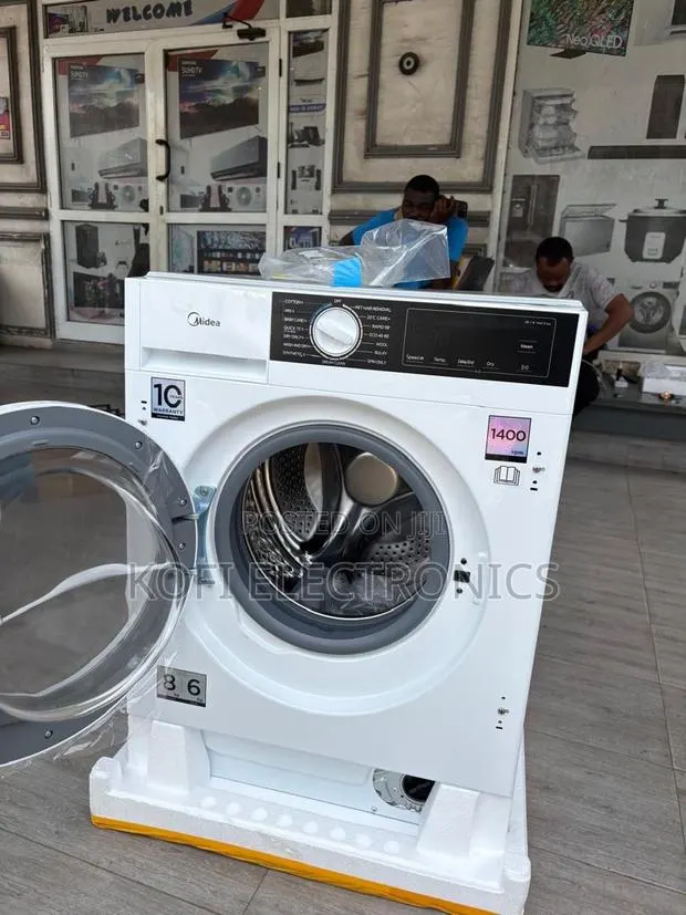 Midea 8kg Washer Dryer Machine All-in-One Convenience · Photo 1