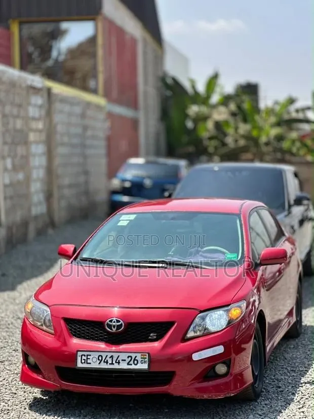 Toyota Corolla 2010 Red · Photo 1