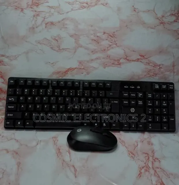The Hp Cs700 Wireless Keyboard and Mouse · Photo 1