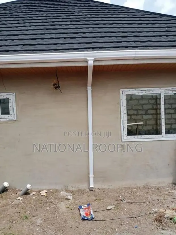 White PVC Rain Gutter and Downpipe