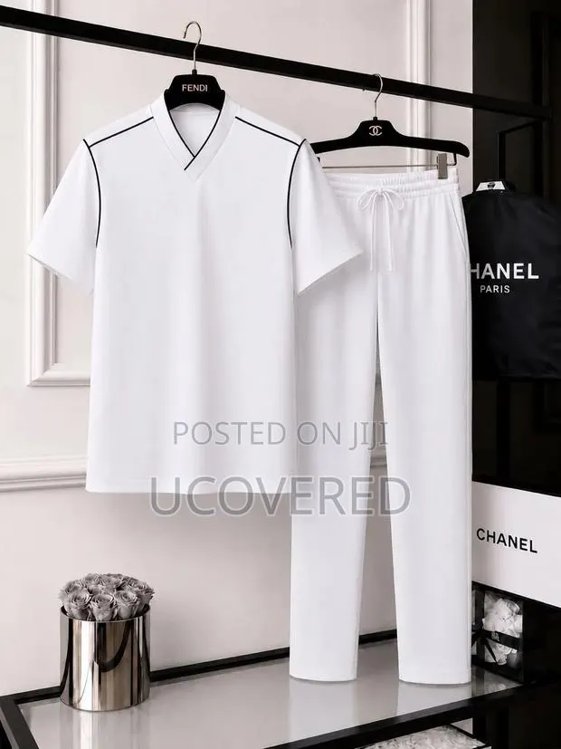 Two-Piece Set Features a Classic Polo Shirt and Matching Joggers · Photo 1