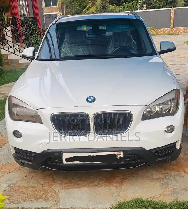 BMW X1 sDrive28i 4dr SUV (2.0L 4cyl Turbo 8A) 2014 White · Photo 1