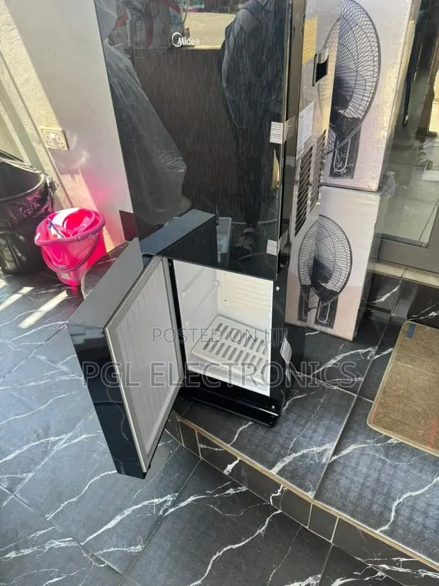 Midea 3 Taps Premium Black Water Dispenser With 20Ltr Fridge Cabinet · Photo 1