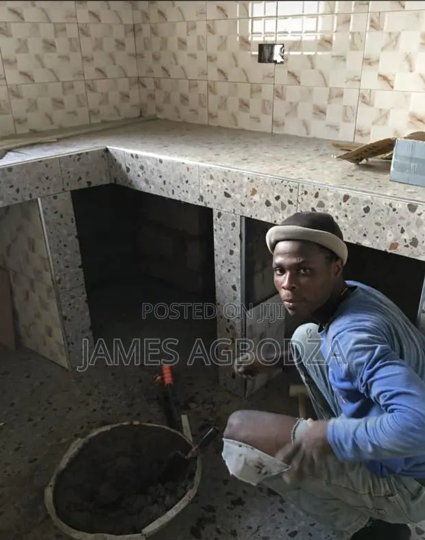 Good Master in Tile’S Fixing. · Photo 1