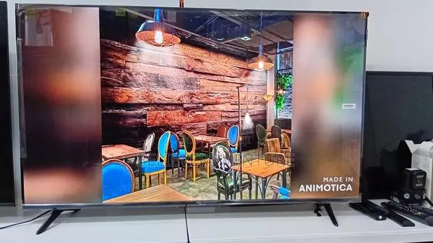 A Bigger, Brighter 50-Inch Qled Experience · Photo 1