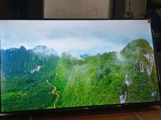 TCL 32” Digital Entertainment Tv for Family Viewing · Photo 1