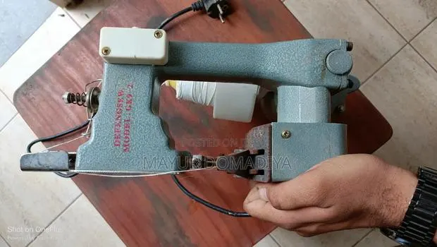 Sack Sewing Machine · Photo 1