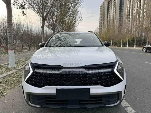Kia Sportage 2023 White · Photo 1