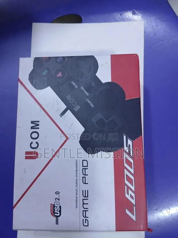 Single U Com Cable Game Pad · Photo 1