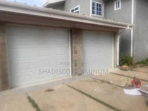 Double Garage Doors · Photo 1