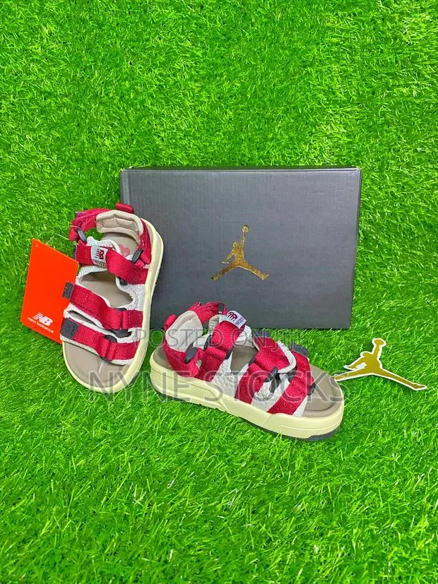 New Balance Sandals— Kids · Photo 1