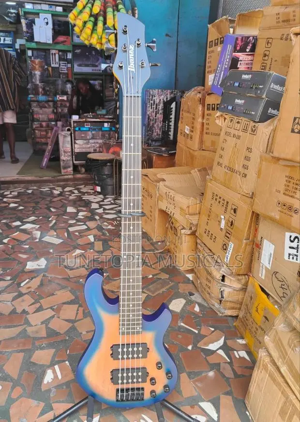 Ibanez 5-String Active Bass Guitar With a Blue-to-Natural Burst Finish · Photo 1