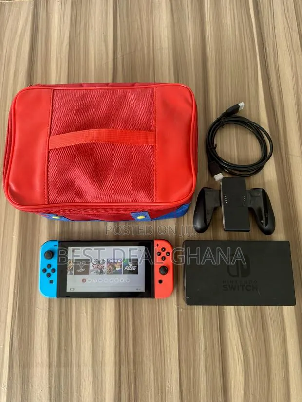 Nintendo Switch With Games and Accessories · Photo 1