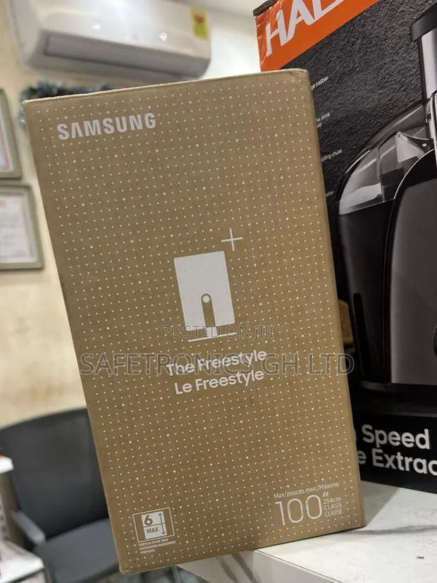Essential White 30”-100” Samsung Freestyle Projector · Photo 1