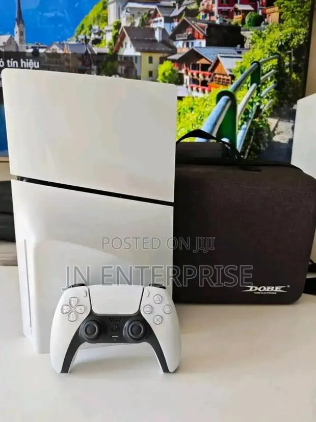 PS5 Slim With Games · Photo 1