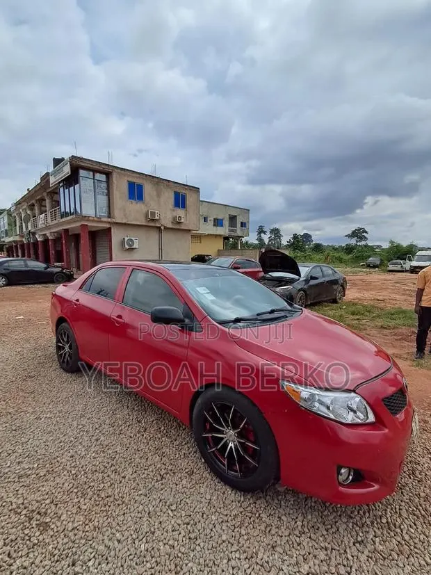 Toyota Corolla 2010 Red · Photo 1