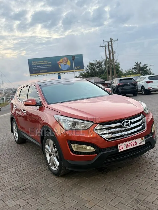 Hyundai Santa Fe Limited 4dr SUV AWD (3.3L 6cyl 6A) 2015 Orange · Photo 1