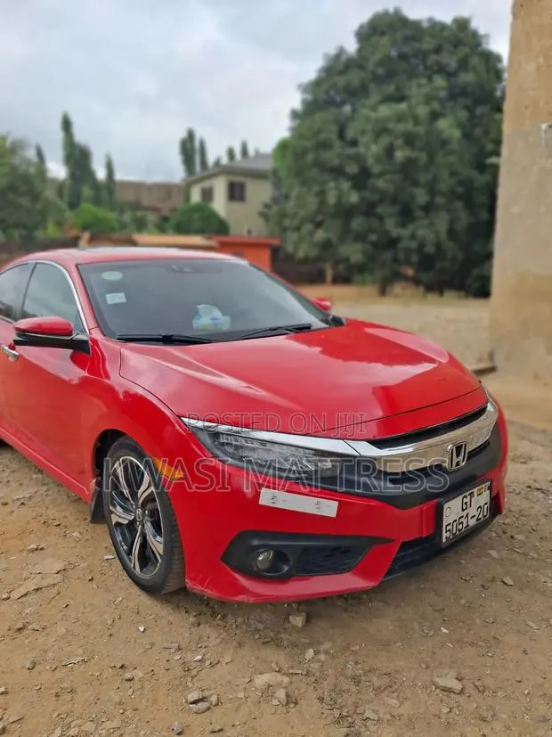 Honda Civic Touring 2dr Coupe (1.5L 4cyl) 2016 Red · Photo 1