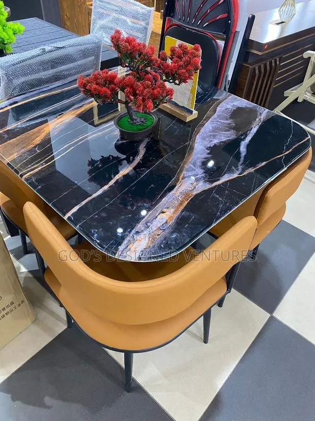An Eye Catching 4 Seater Marble Dining Set · Photo 1