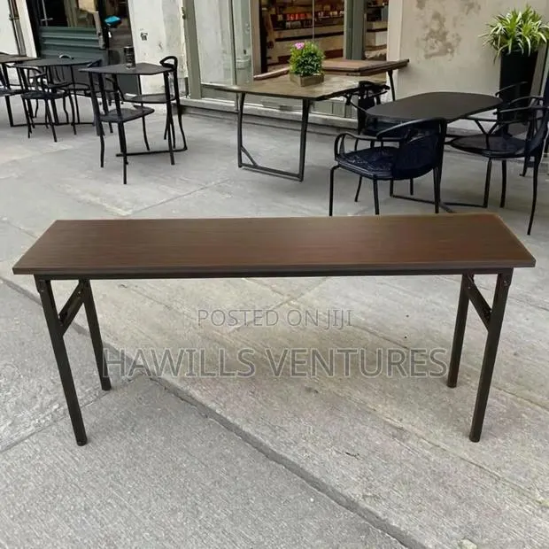 Foldable Banquet Table Featuring a Mahogany Melamine Top. · Photo 1