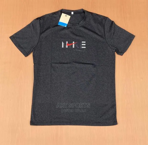 Nike Tops. · Photo 1