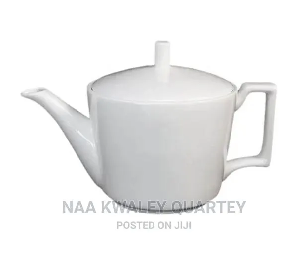 White Ceramic Tea Pot · Photo 1
