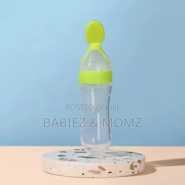 Silicone Baby Feeding Bottle With Spoon – Mess-free Feeding! · Photo 1