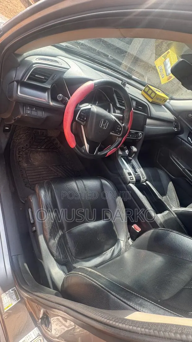 Honda Civic Touring 4dr Sedan (1.5L 4cyl) 2017 Silver · Photo 1