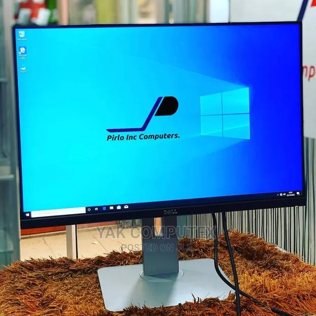 Dell 24 Inch Edgless Ips · Photo 1