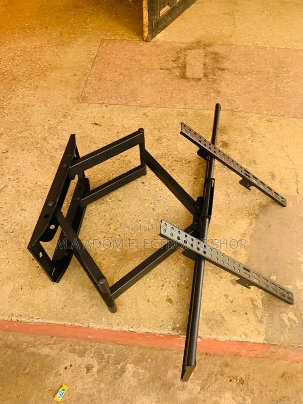 Universal Fit: Adjustable 32"-70" TV Wall Mount · Photo 1