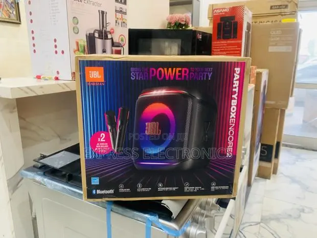 Available Now at Store 2 Microphones JBL Party Box Encore 2 Potable · Photo 1