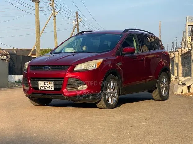 Ford Escape SE 4dr SUV (1.6L 4cyl Turbo 6A) 2014 Red · Photo 1
