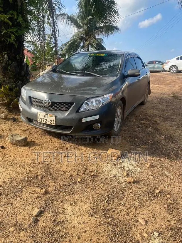 Toyota Corolla 2010 Silver · Photo 1