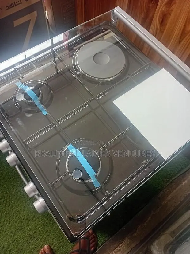 Unitek 4 Gas Burner 50/50 Cooker · Photo 1