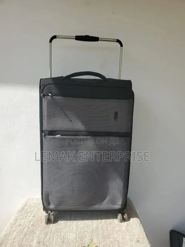 Black and Grey Softside Spinner Luggage · Photo 1