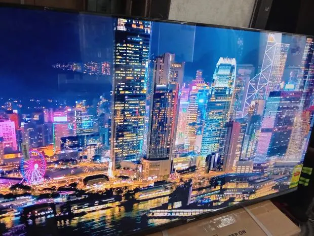 Sigma 55 Uhd Tv Magic, Tv That Makes Moments Bigger. · Photo 1