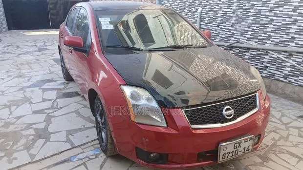 Nissan Sentra 2009 Red · Photo 1