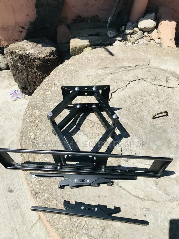 Order Adjustable Tv Bracket for 32”-80” Television. · Photo 1