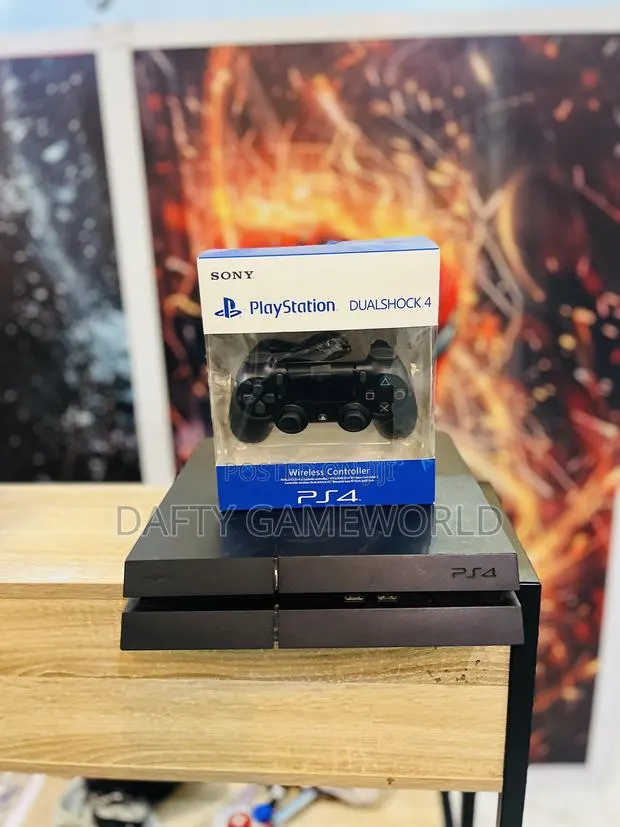 PS4 FAT WITH 2 Controllers and Loaded Games · Photo 1