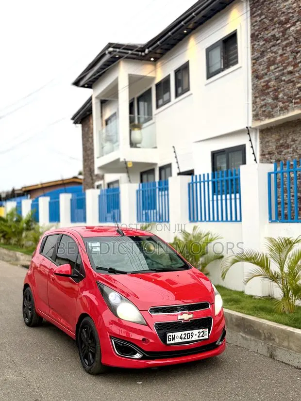 Chevrolet Spark 1LT 4dr Hatchback (1.2L 4cyl CVT) 2014 Red · Photo 1