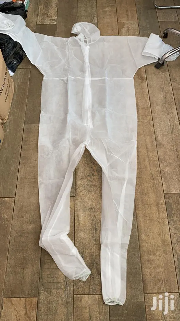 Coverall With Hood; Plain White in Color · Photo 1
