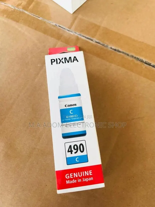 Canon GI-590 Ink Bottles: Vibrant Colors, Low Cost · Photo 1